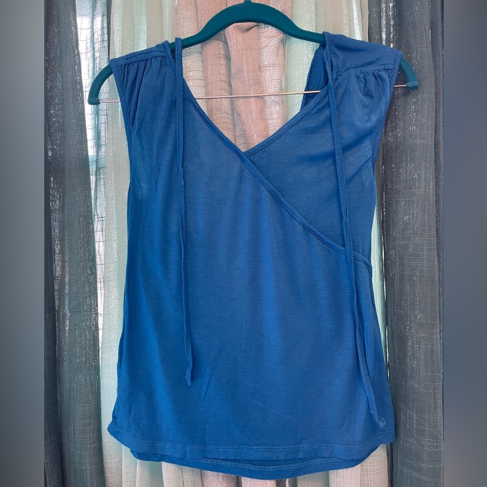 Jersey knit surplice top in royal blue.